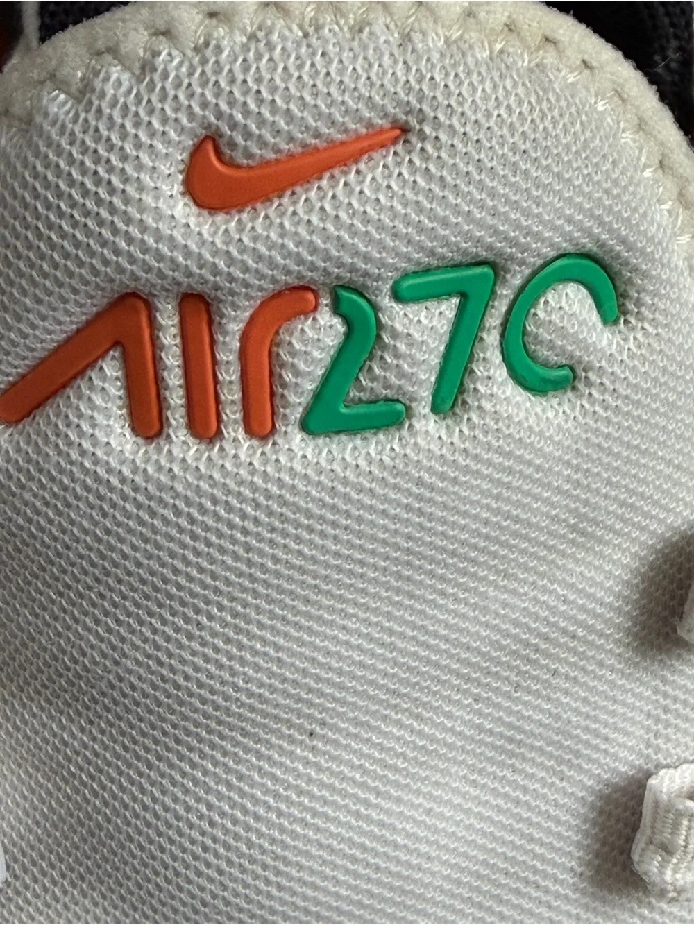 Nike Kids White Sneakers with Black, Orange and Green Accents